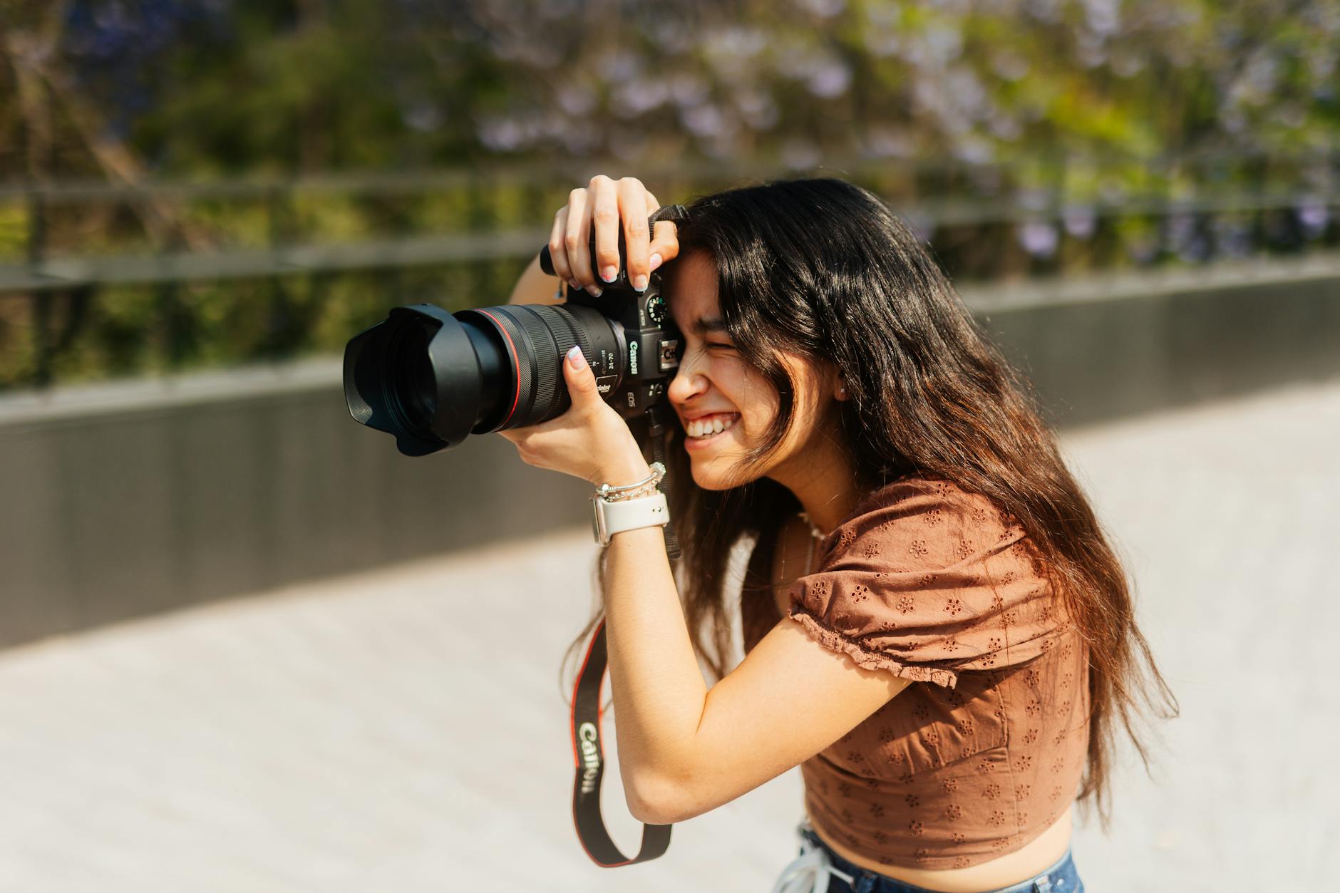 young photographer in action capturing outdoors